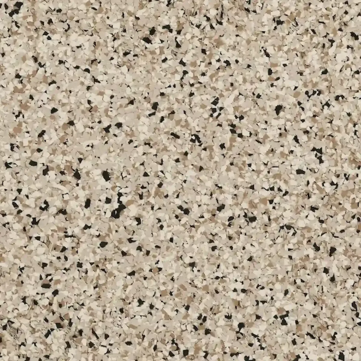 Speckled beige granite countertop with black and white flecks