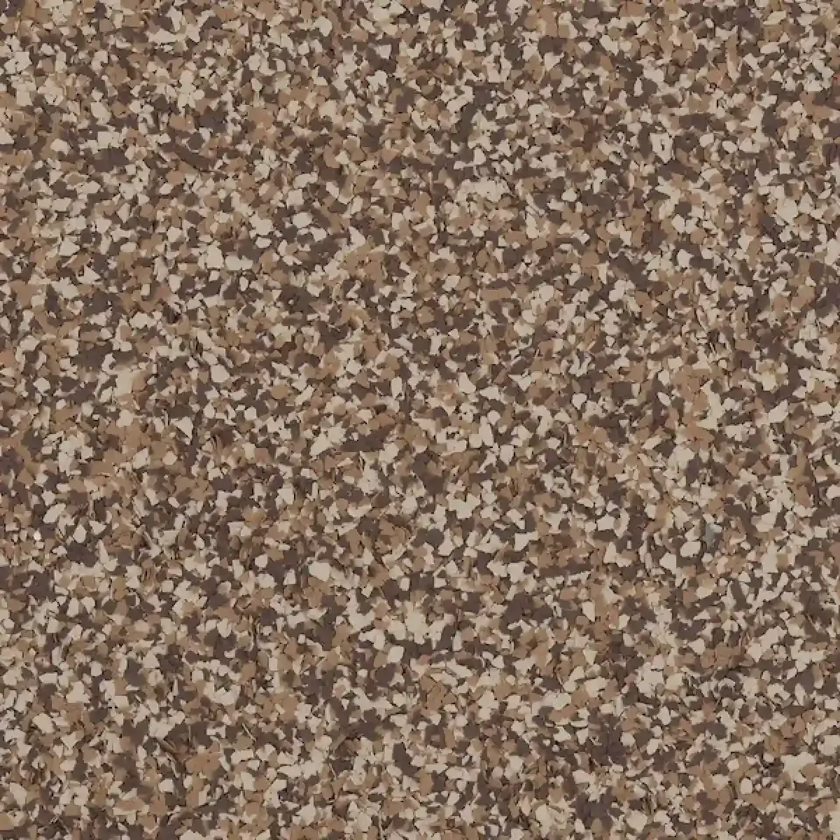 Brown and beige speckled stone or carpet-like texture pattern