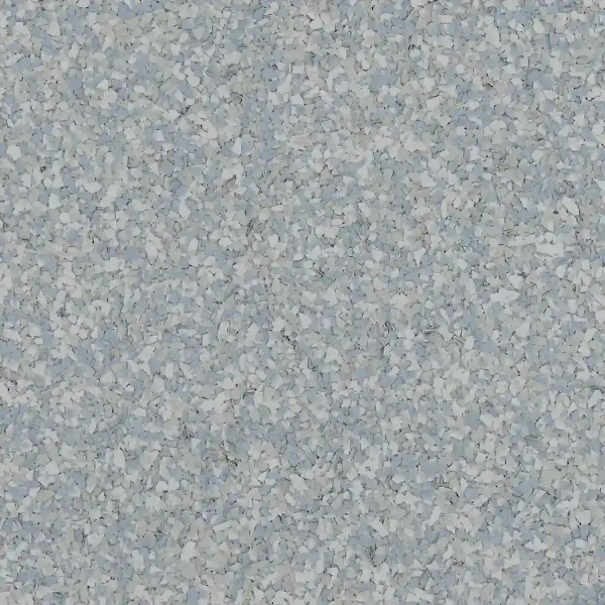 Close-up of a light gray speckled textured surface