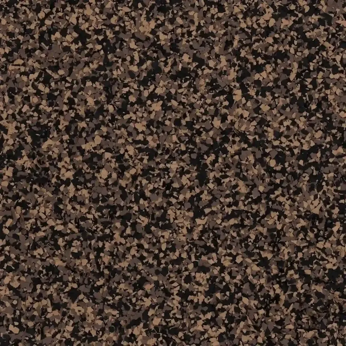 Brown and black speckled stone-like texture filling the frame