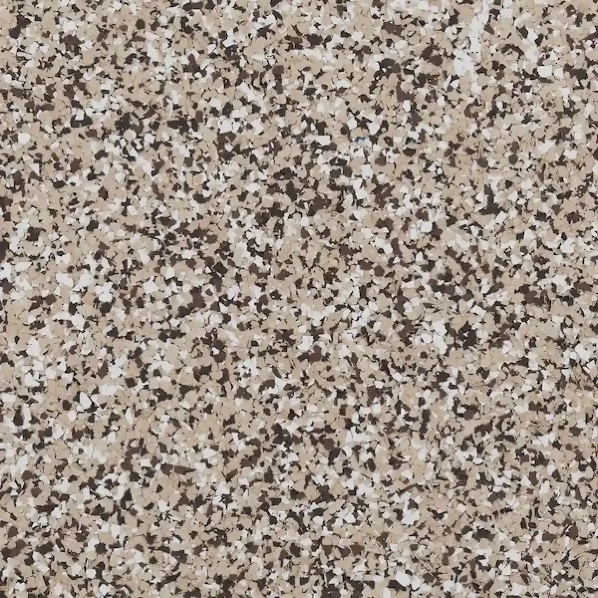 Speckled beige, brown, and gray granite surface texture