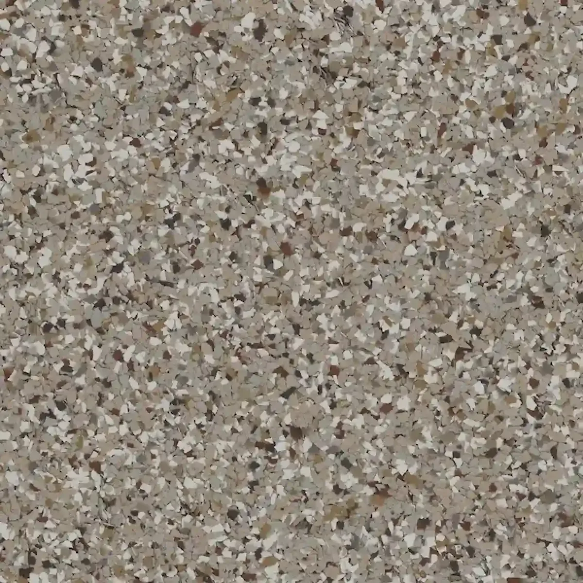 Close-up of beige and brown speckled stone or terrazzo surface