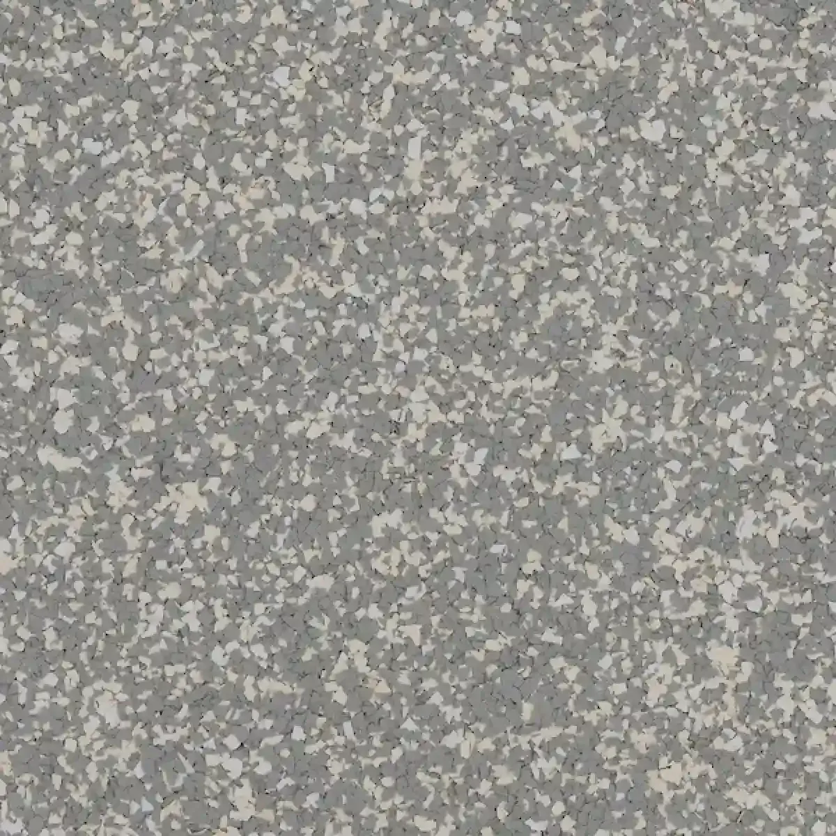 Gray speckled textured surface with small white and darker flecks