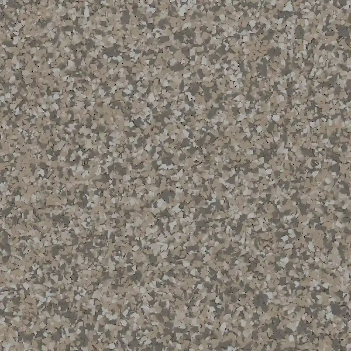 Close-up of a speckled gray and brown textured surface, like stone or carpet.