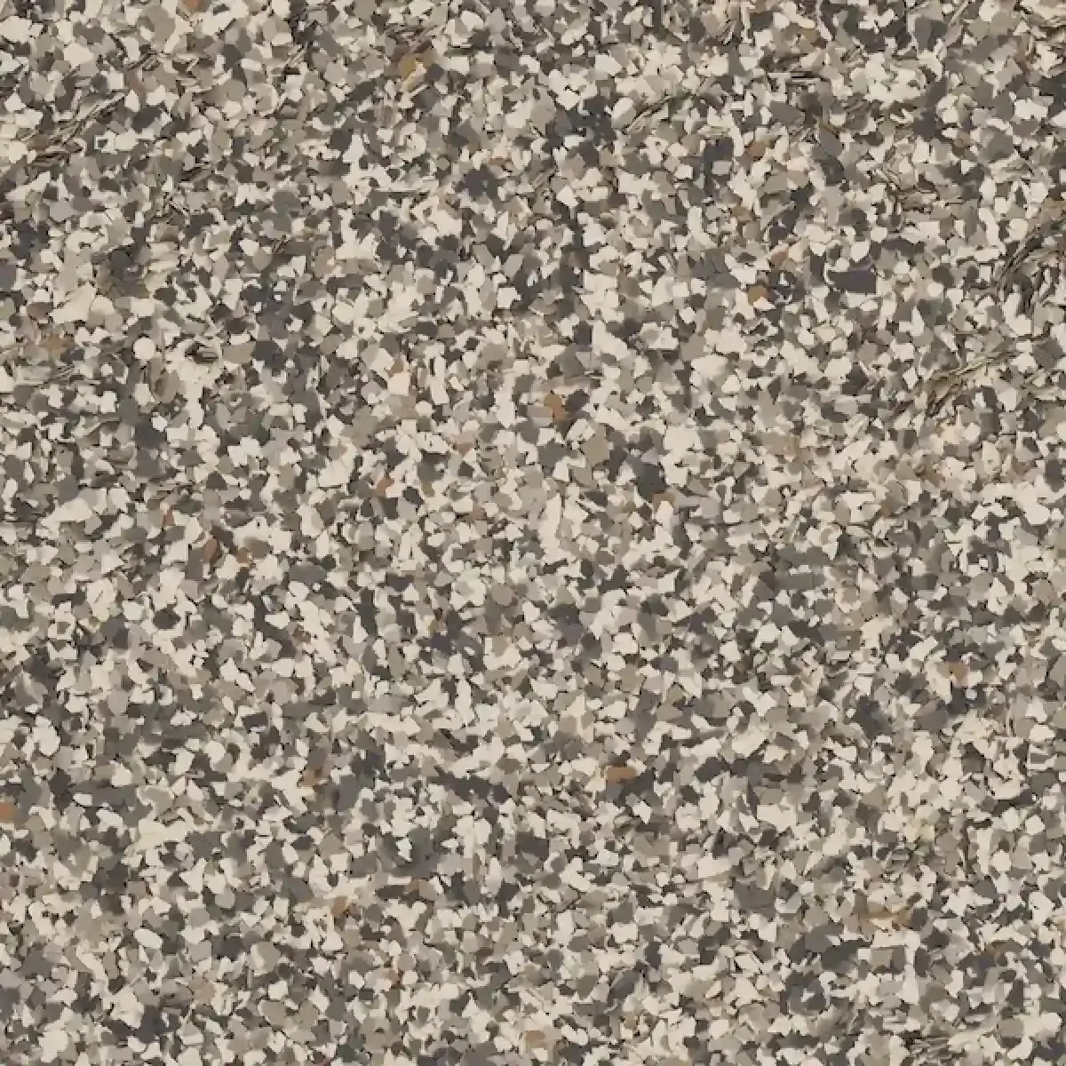 Speckled gray, beige, and brown stone or granite texture pattern