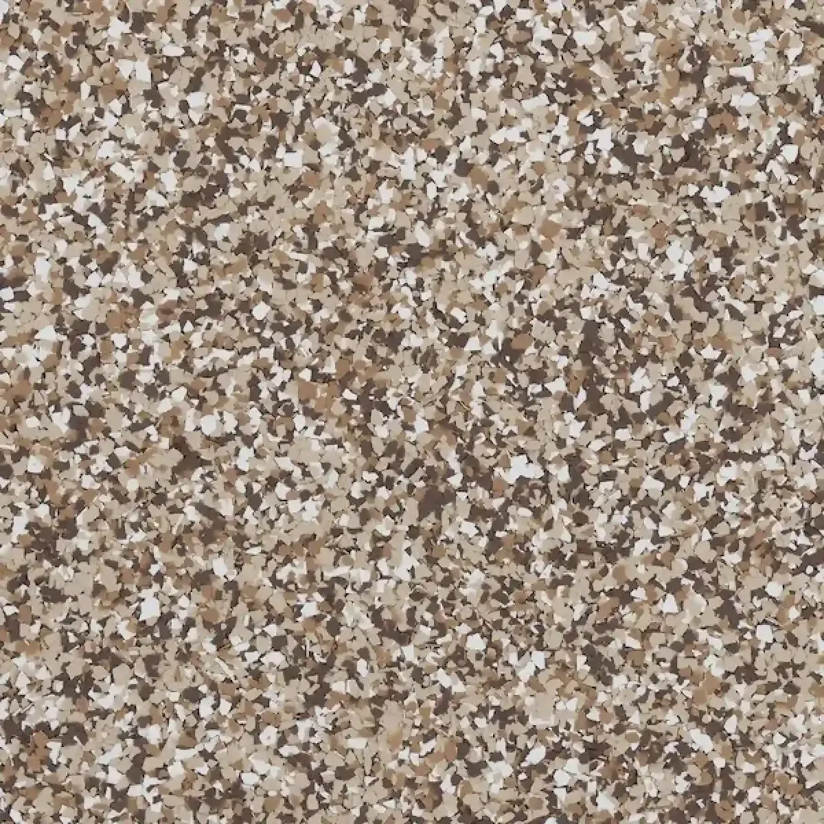 Close-up of a speckled brown, beige, and white textured surface