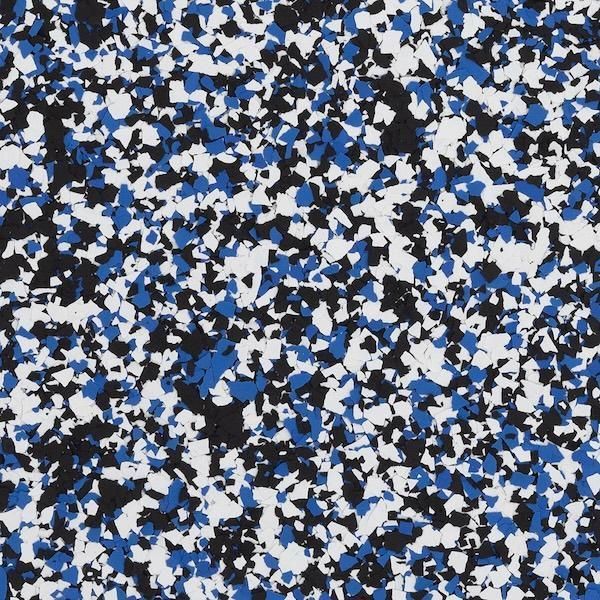 Abstract blue, black, and white speckled pattern resembling confetti or terrazzo.