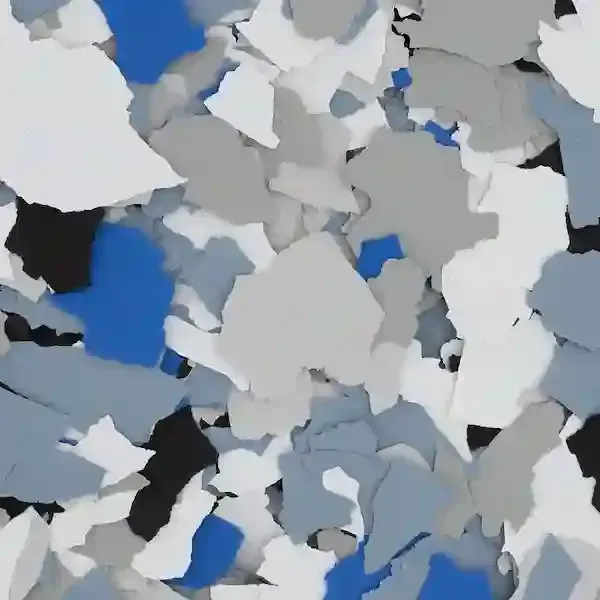 Abstract close-up of overlapping white, gray, and blue paper-like shapes