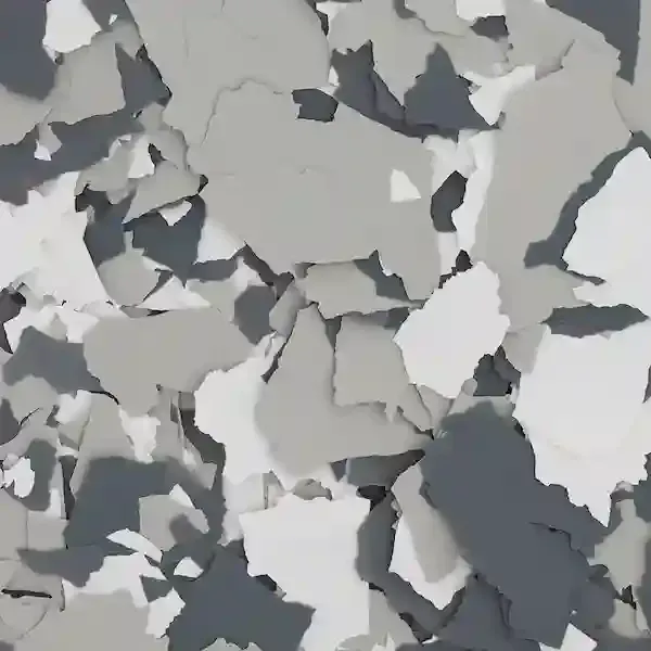 Abstract pattern of overlapping torn paper pieces in white, gray, and dark gray on a neutral background