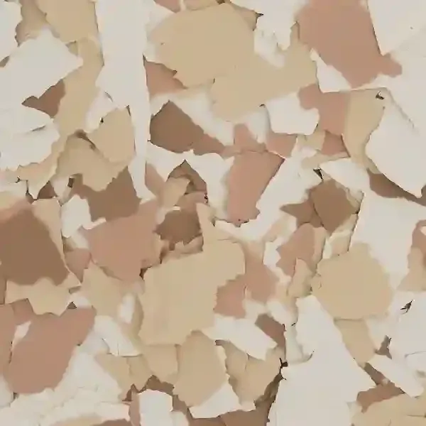 Scattered beige and white paper flakes filling the frame