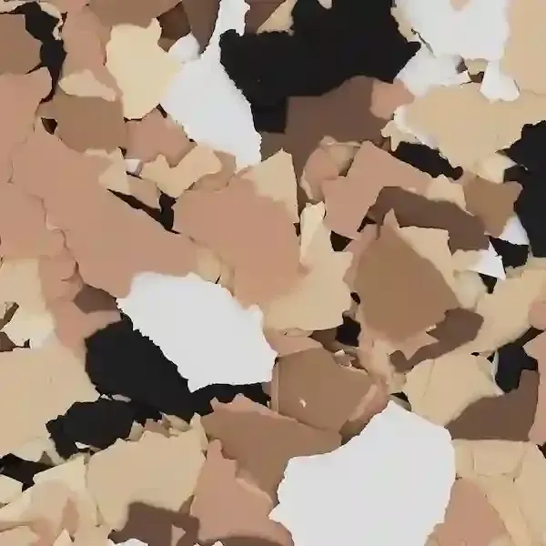 Abstract pattern of irregular beige, tan, white, and black shapes