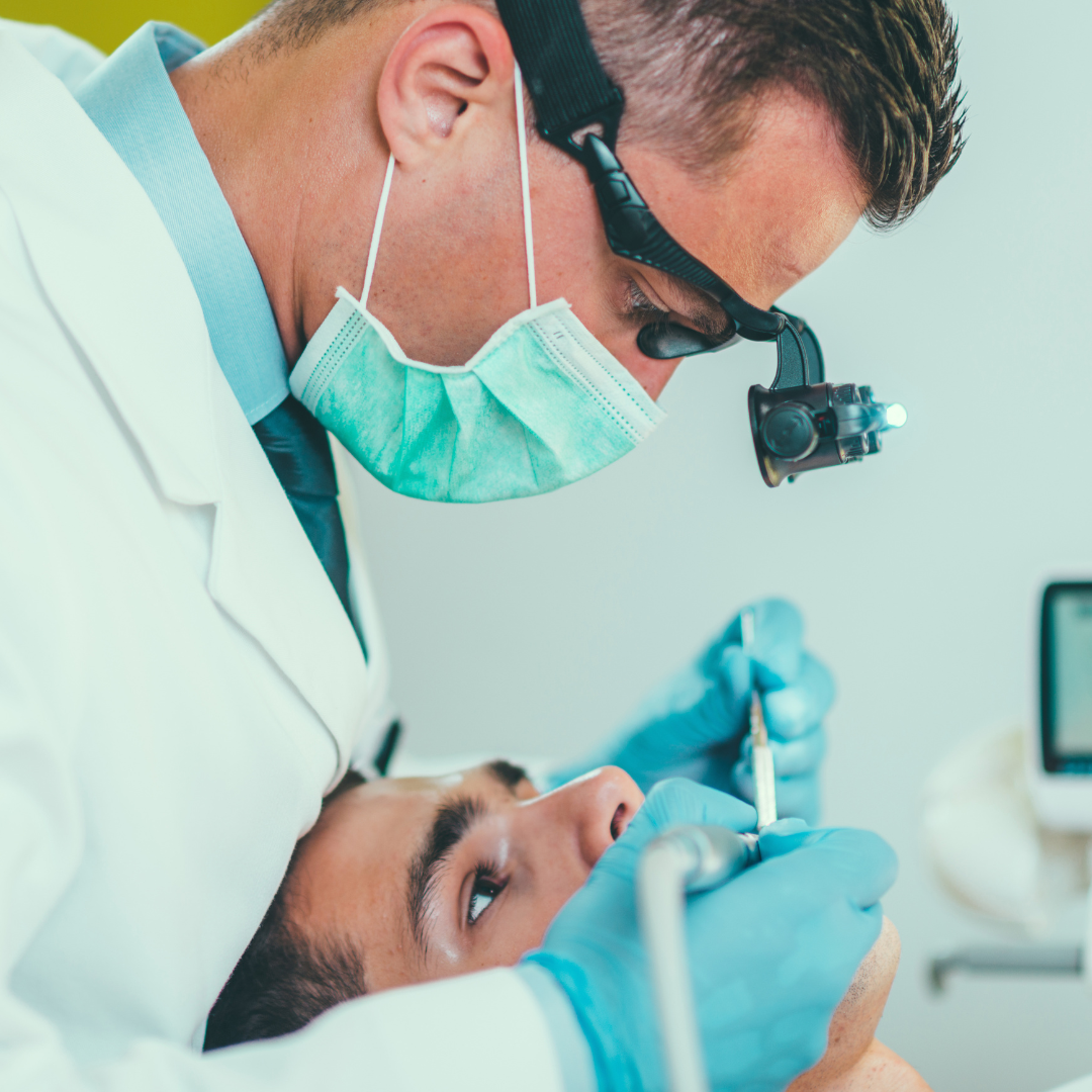 dentist doing a root canal procedure