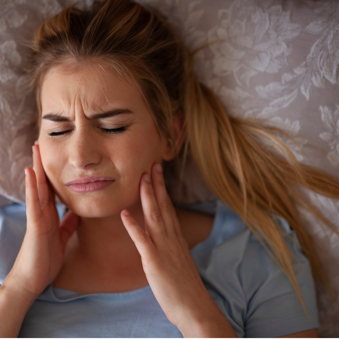 a girl with TMJ pain