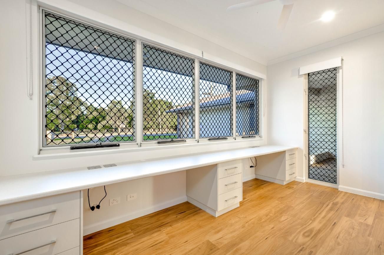 A Room With a Long Desk and Lots of Windows — Ashlee Jones Homes in Gordonvale, QLD