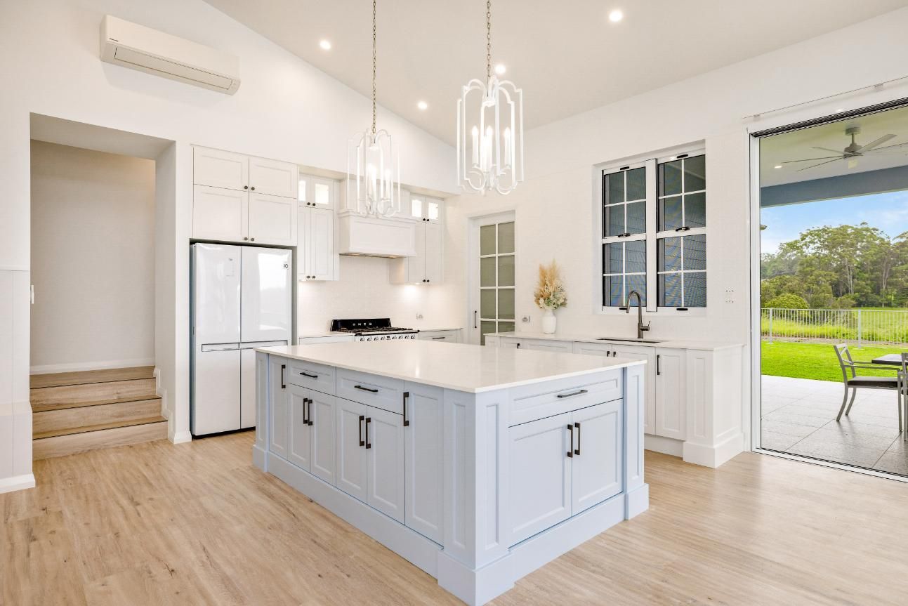 There is a Large Island in the Middle of the Kitchen — Ashlee Jones Homes in Gordonvale, QLD
