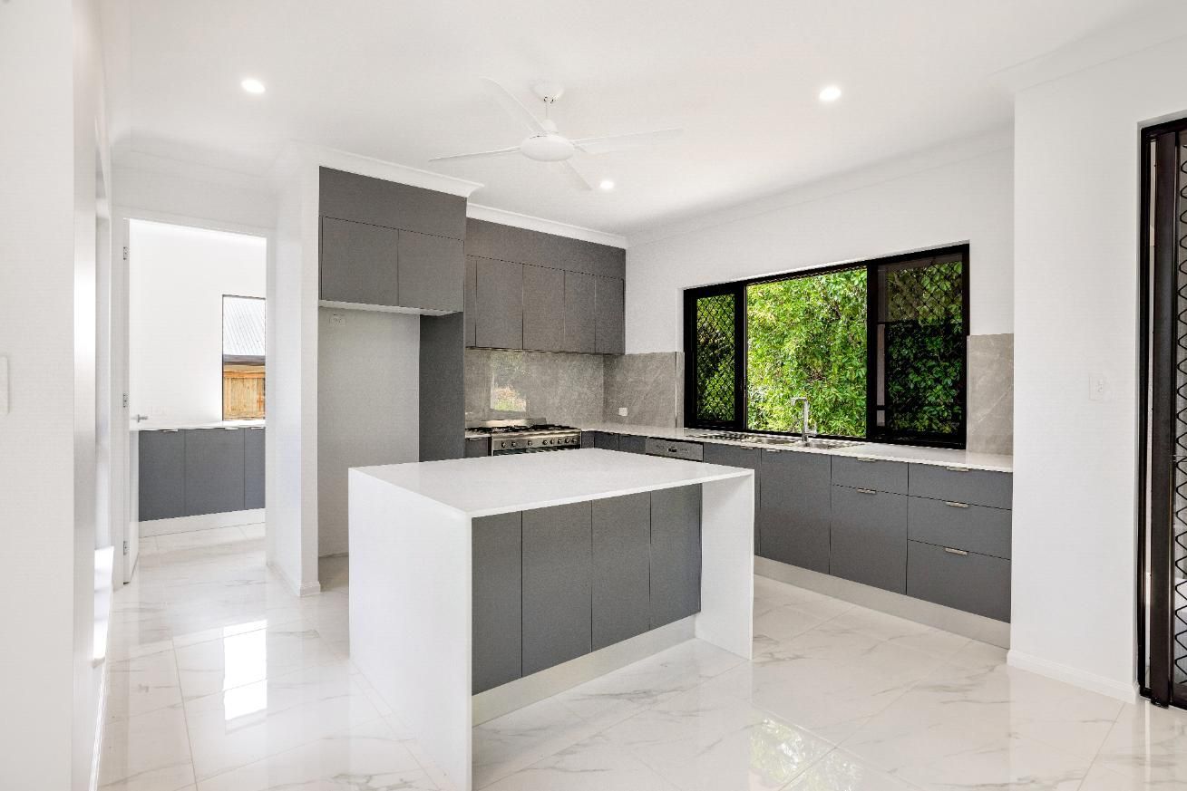 There is a Large Island in the Middle of the Kitchen — Ashlee Jones Homes in Gordonvale, QLD