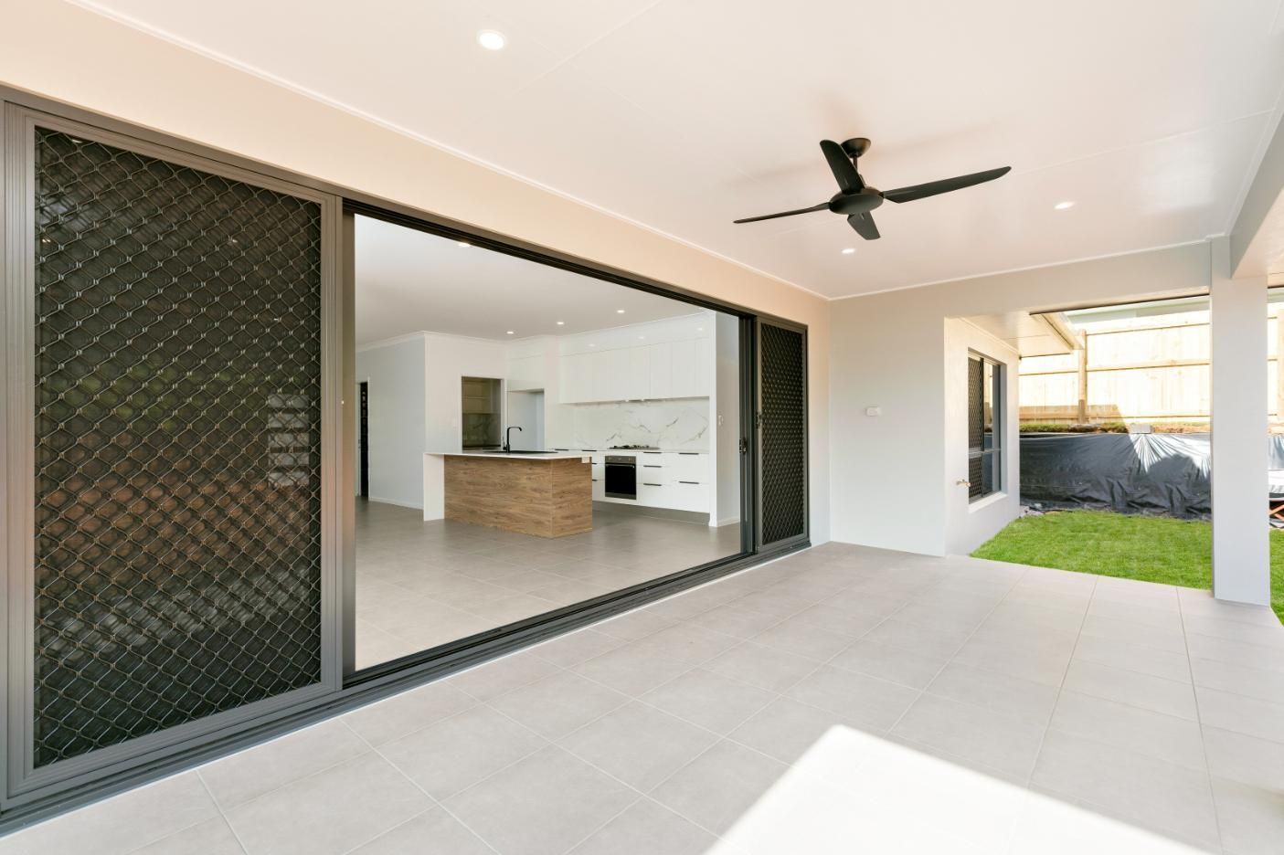 There is a Ceiling Fan in the Corner of the Room — Ashlee Jones Homes in Gordonvale, QLD