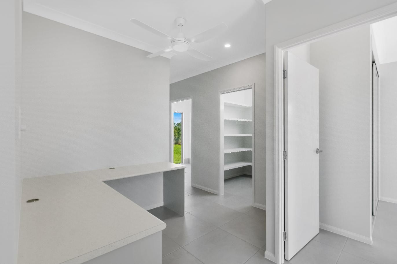 There is a Desk in the Middle of the Room — Ashlee Jones Homes in Gordonvale, QLD