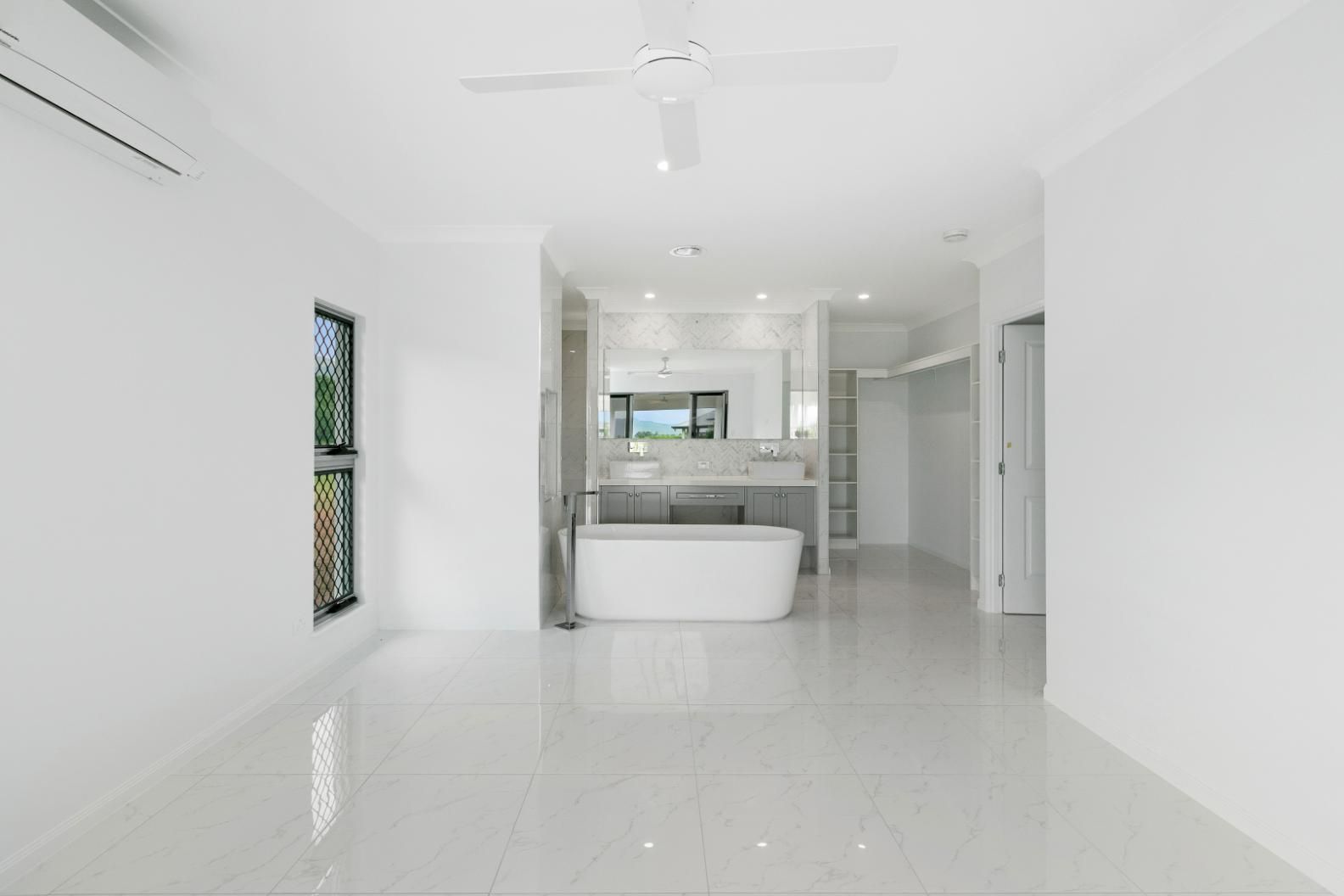 There is a Bathtub in the Middle of the Room — Ashlee Jones Homes in Gordonvale, QLD