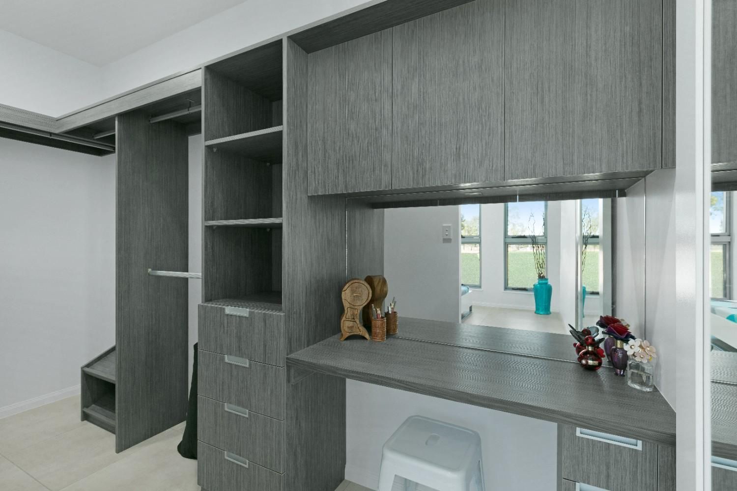 A Room With a Desk and a Mirror in It — Ashlee Jones Homes in Gordonvale, QLD