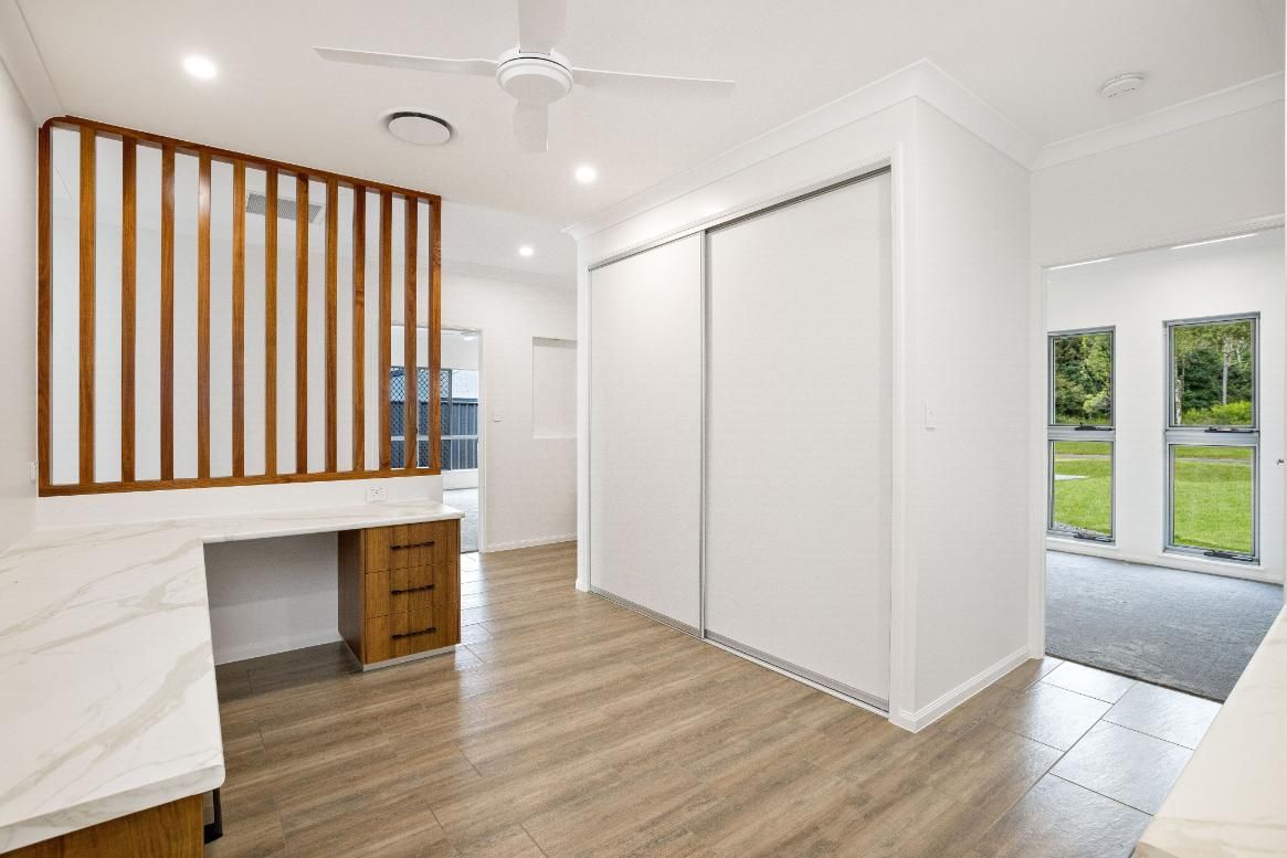 There is a Desk in the Middle of the Room — Ashlee Jones Homes in Gordonvale, QLD