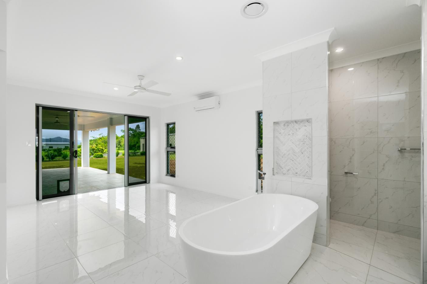 There is a Bathtub in the Middle of the Room — Ashlee Jones Homes in Gordonvale, QLD