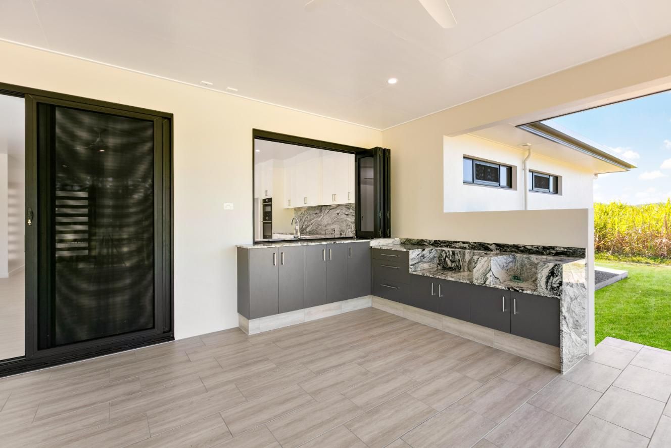 There is a Kitchen in the Backyard of a House — Ashlee Jones Homes in Gordonvale, QLD