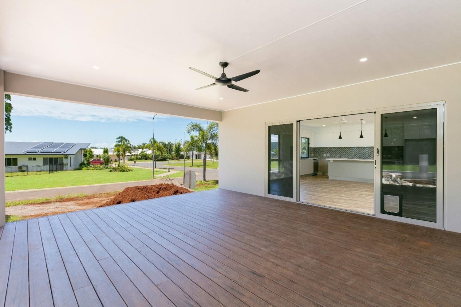 There is a Ceiling Fan on the Deck of a House — Ashlee Jones Homes in Gordonvale, QLD