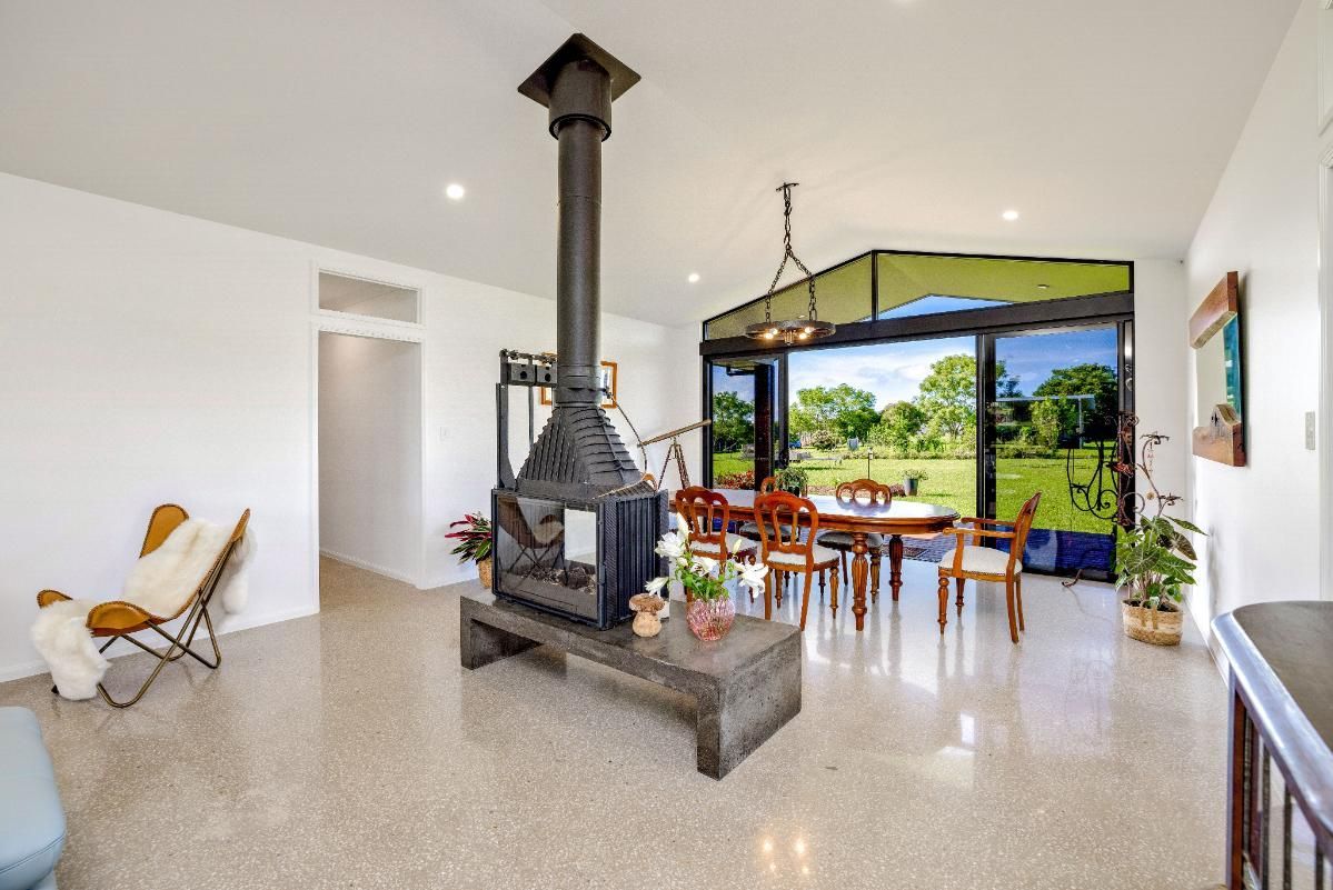 There is a Fireplace in the Middle of the Living Room — Ashlee Jones Homes in Gordonvale, QLD