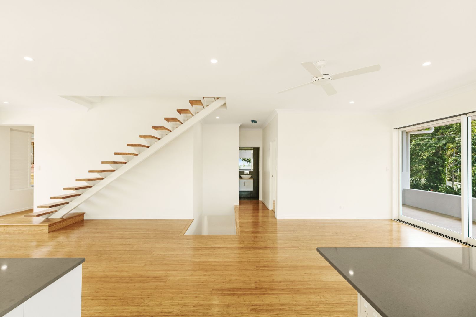 There is a Staircase in the Middle of the Room — Ashlee Jones Homes in Gordonvale, QLD