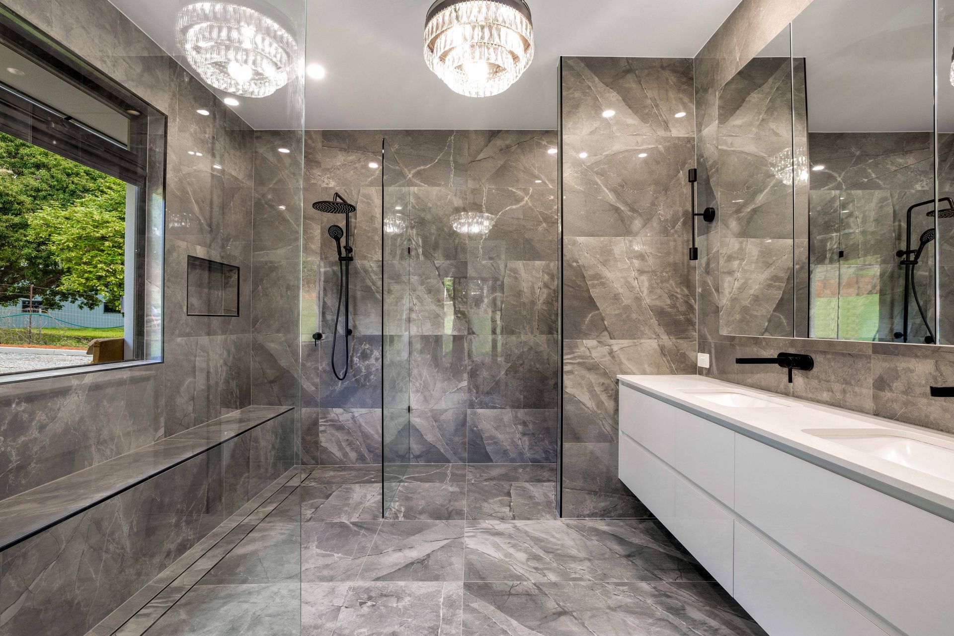 A Bathroom With A Walk In Shower And Two Sinks — Ashlee Jones Homes in Gordonvale, QLD