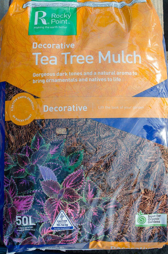 A bag of decorative tea tree mulch.