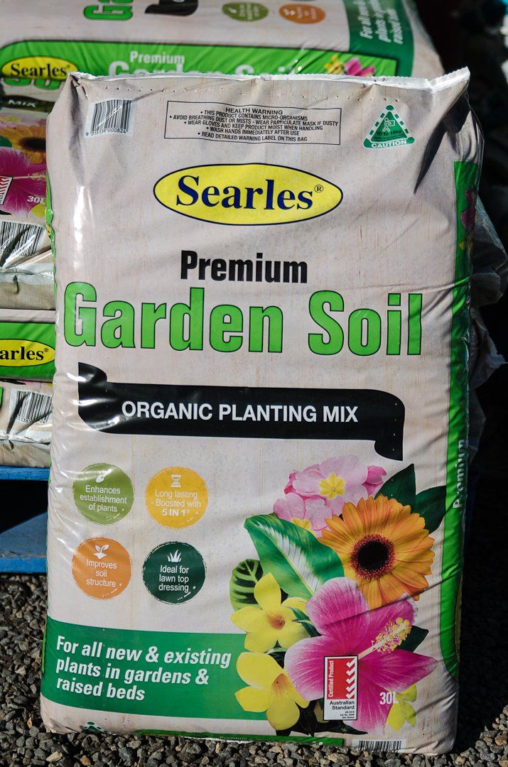 A bag of Searles premium garden soil organic planting mix.