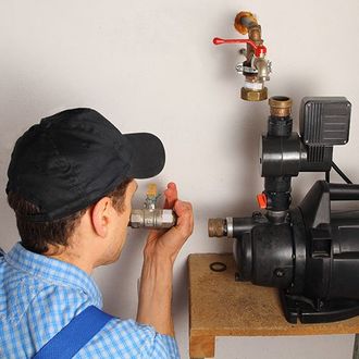 Man installing a water pump