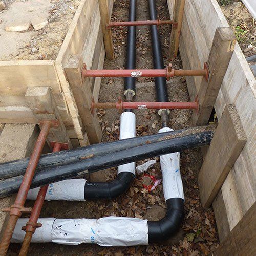 Geothermal heating and cooling systems