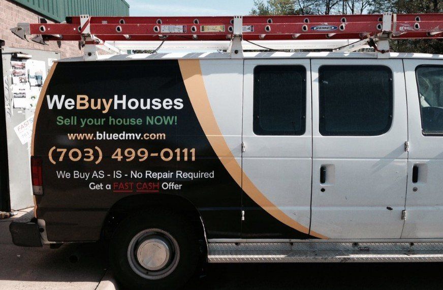 A van that says webuyhouses sell your house now