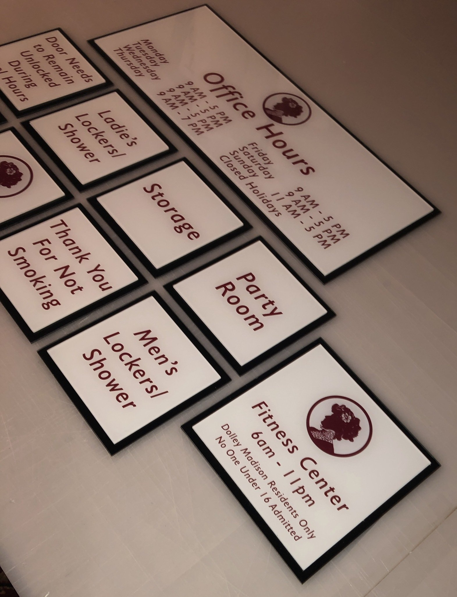 A set of signs including one for the fitness center