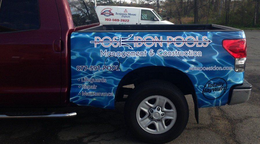 A red truck with the word pool on the back of it