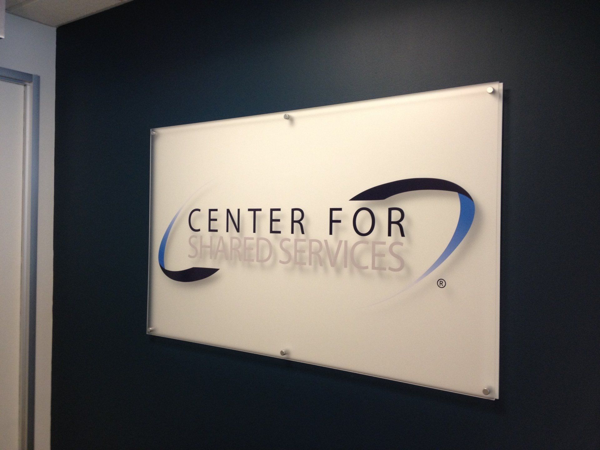 A sign that says center for shared services on it
