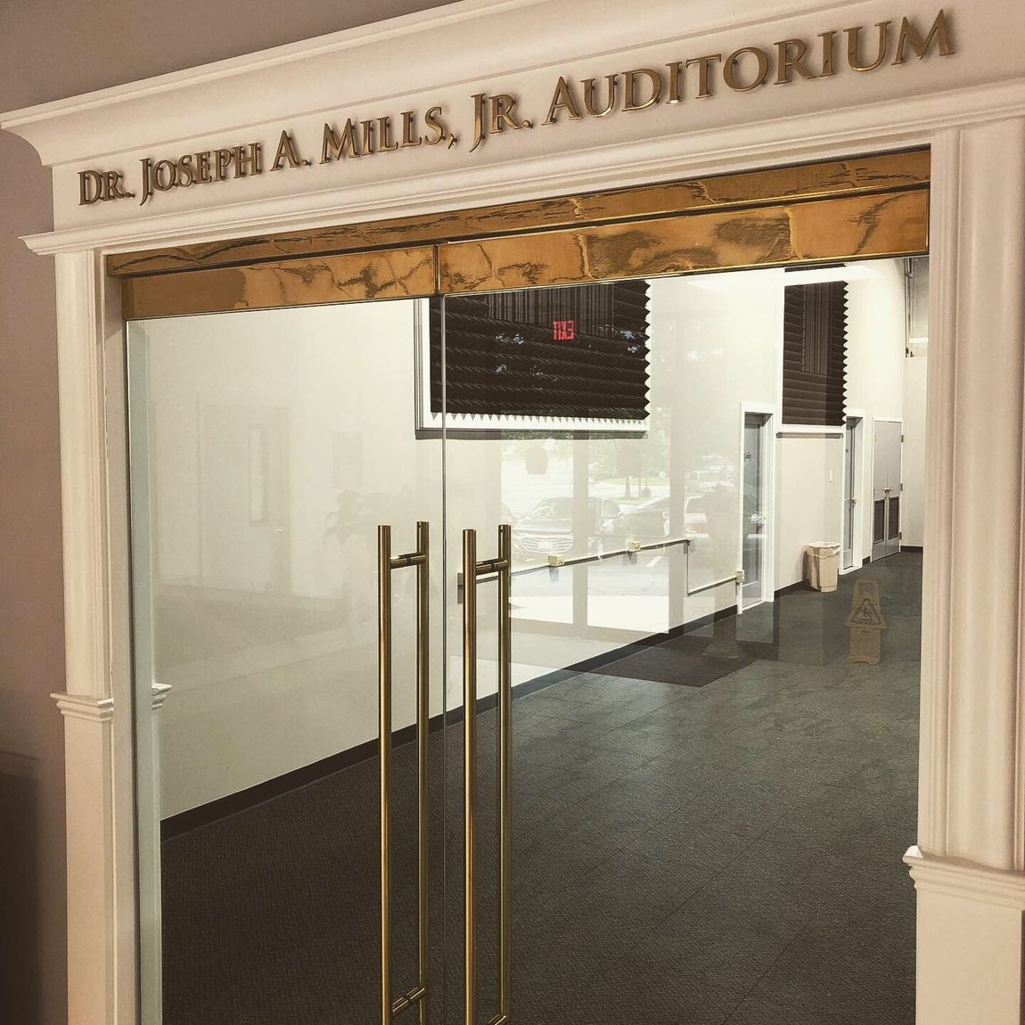 The entrance to the joseph a mills jr auditorium