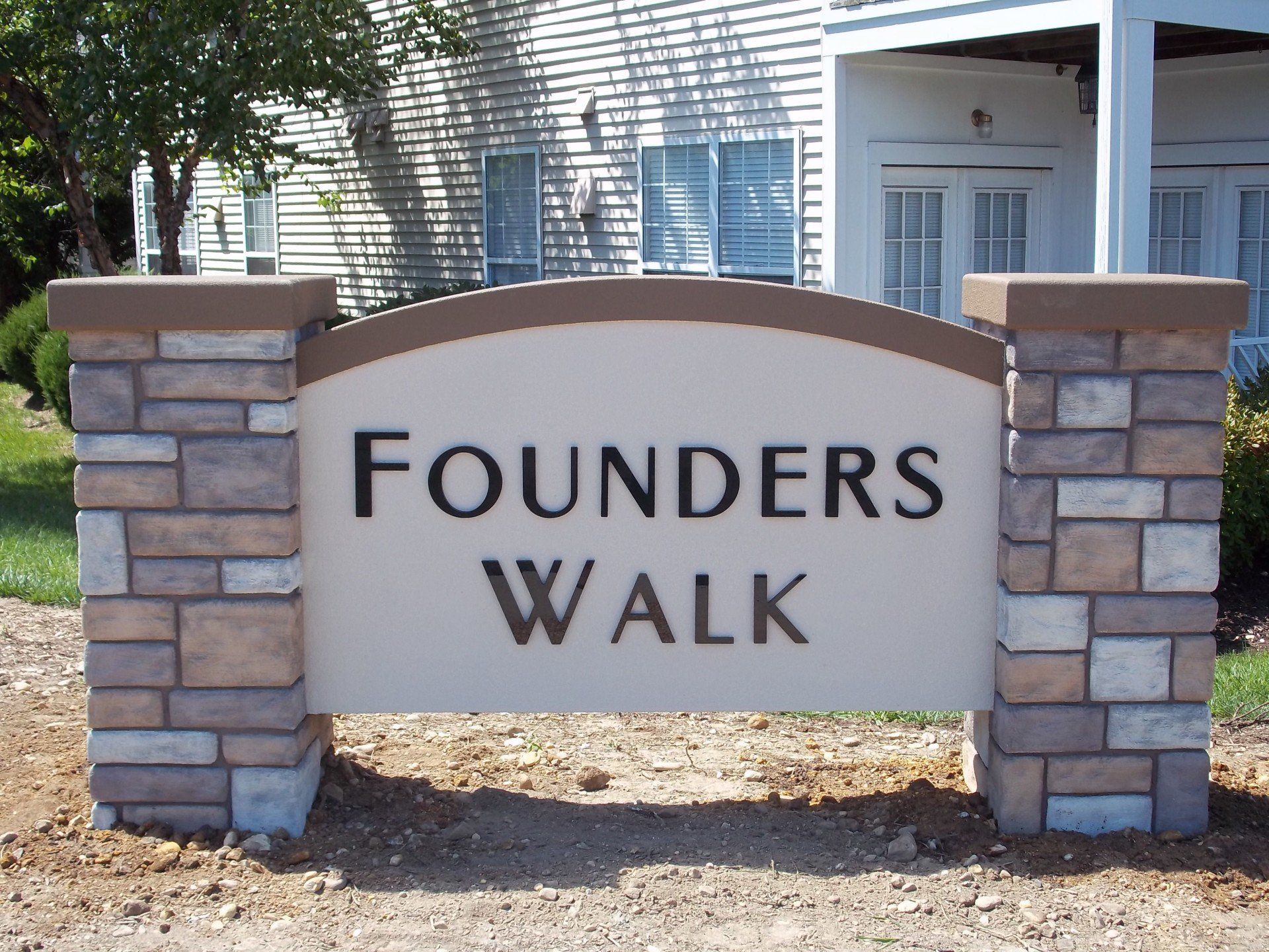 A sign that says founders walk on it