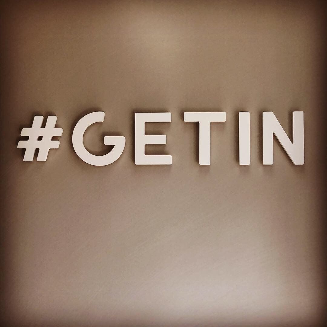 The word getin that is on a brown background