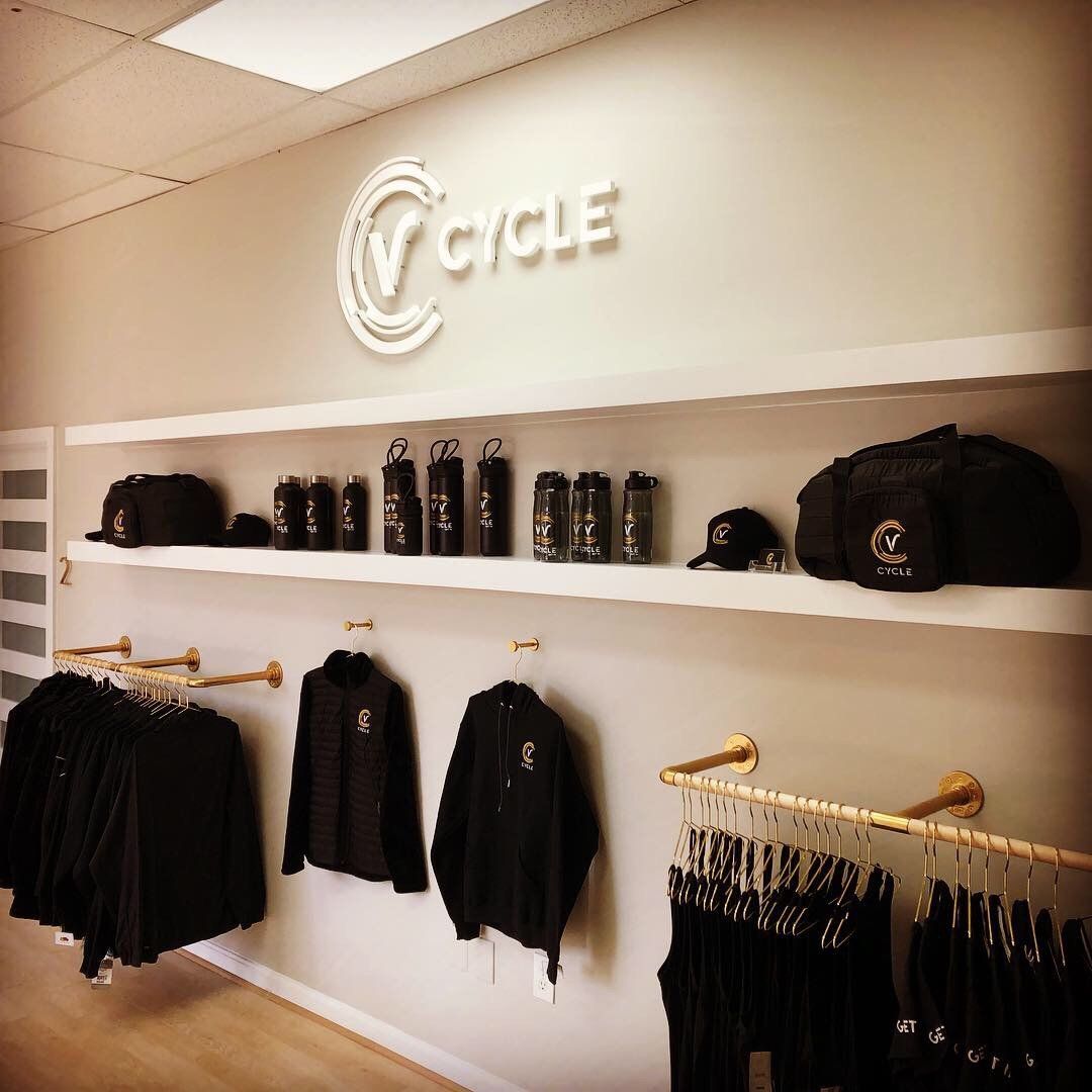 A store with a sign that says cycle on it