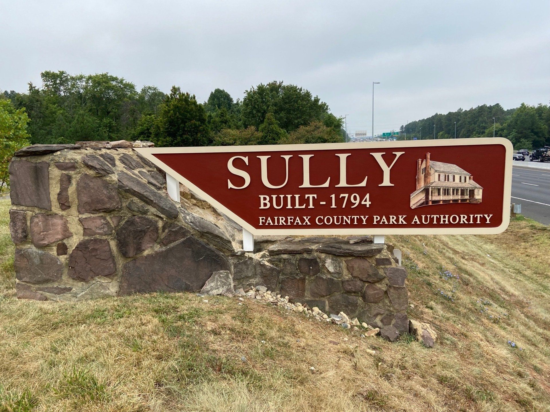 A sign that says sully built - 1794 fairfax county park authority