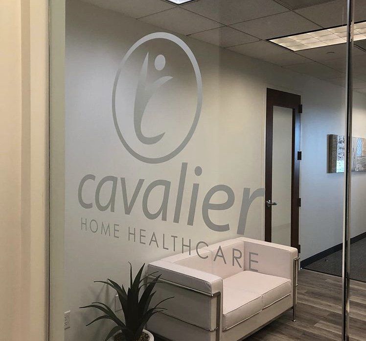 A room with a chair and a sign that says cavalier home healthcare