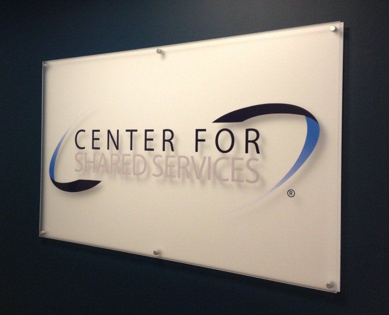 A sign that says center for shared services on it