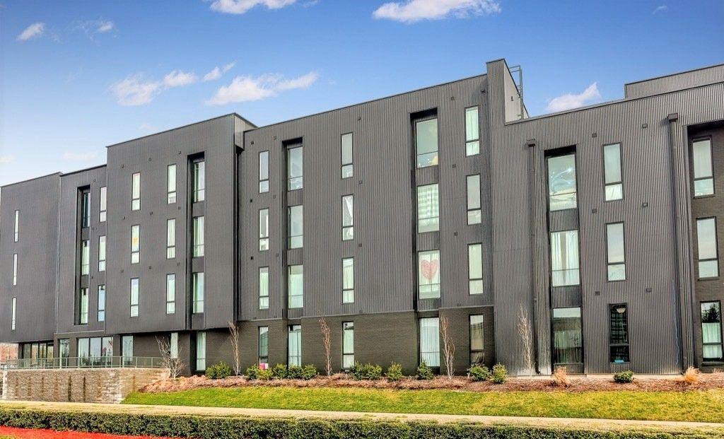 1-Bedroom Luxury Apartments in Clarksville, TN | Main608 | Exterior View of Apartment Complex with Landscaping.