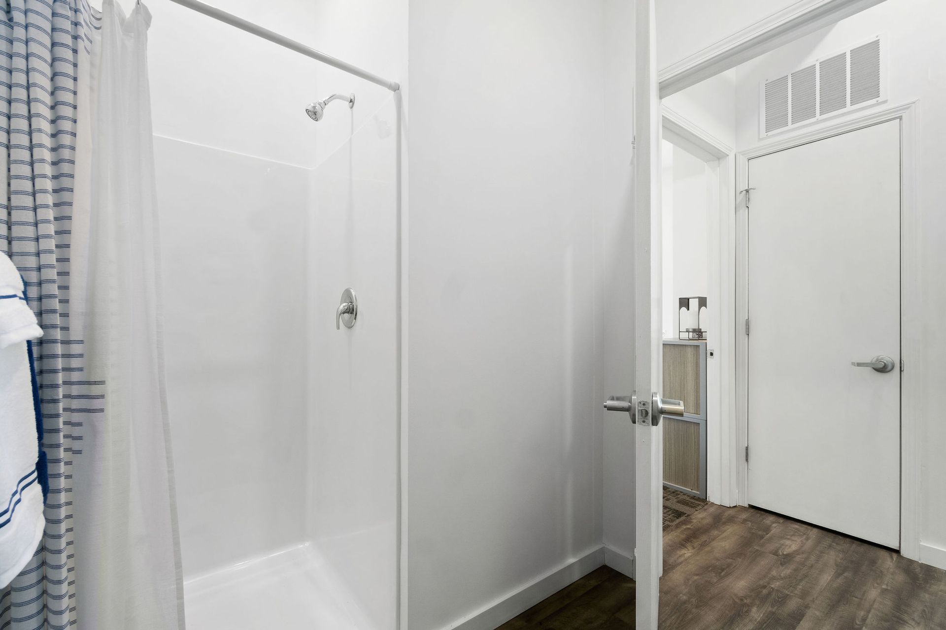 Photo showing a bathroom with a stall-style shower
