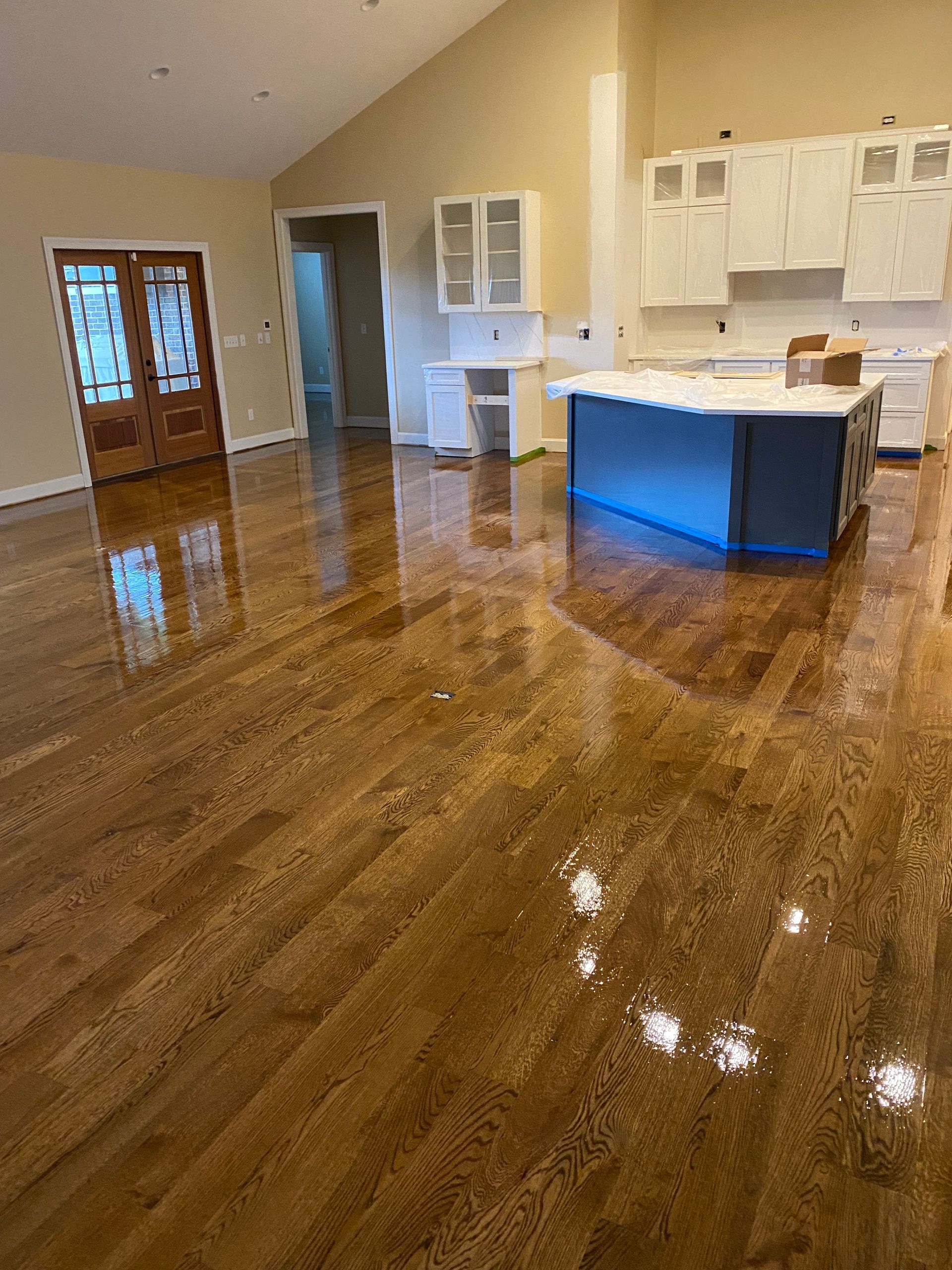 A Kitchen With Hardwood Floor And White Cabinets | Lexington, KY | Hometown