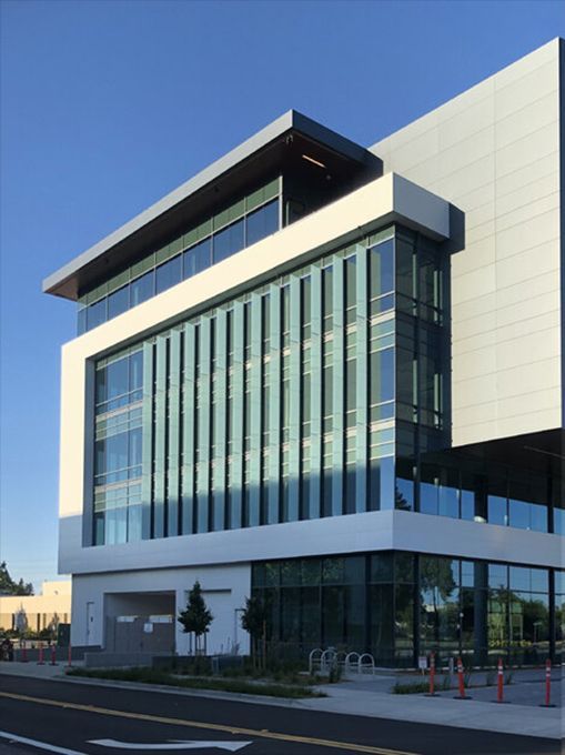 A large white building with a lot of windows